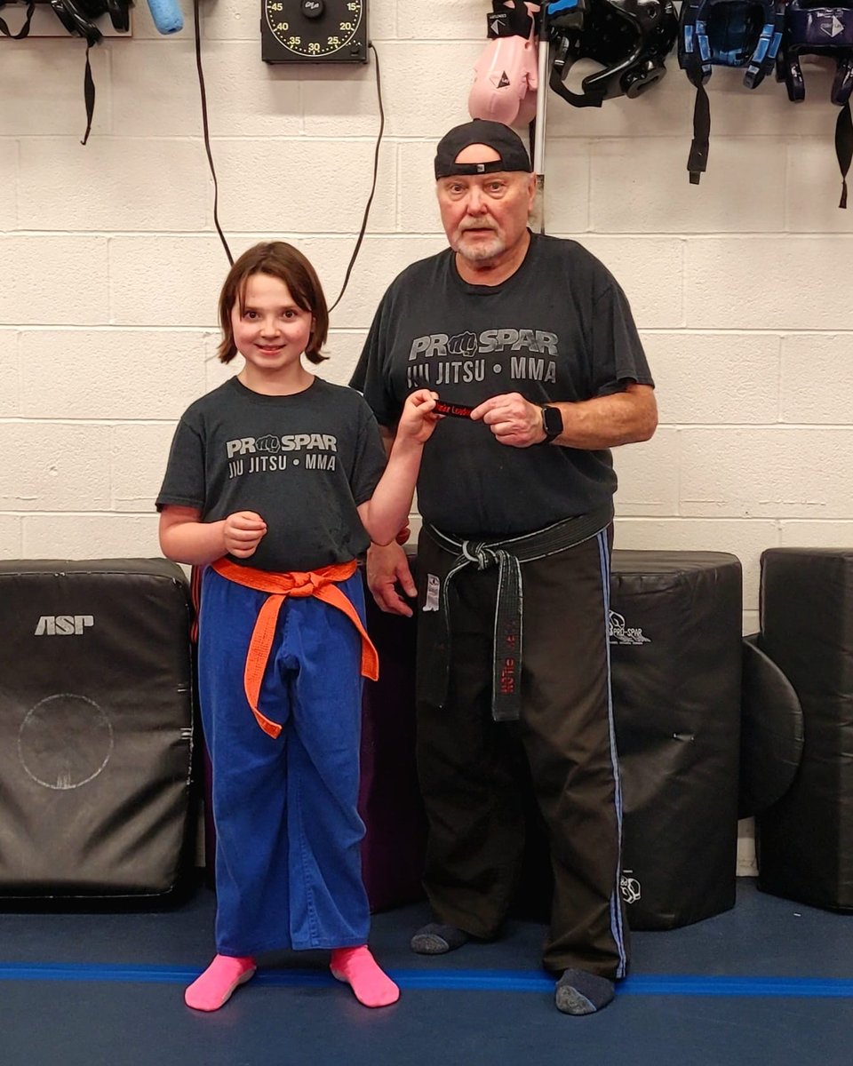 Alison receiving her Junior Leader badge at ProSpar Martial Arts Centre